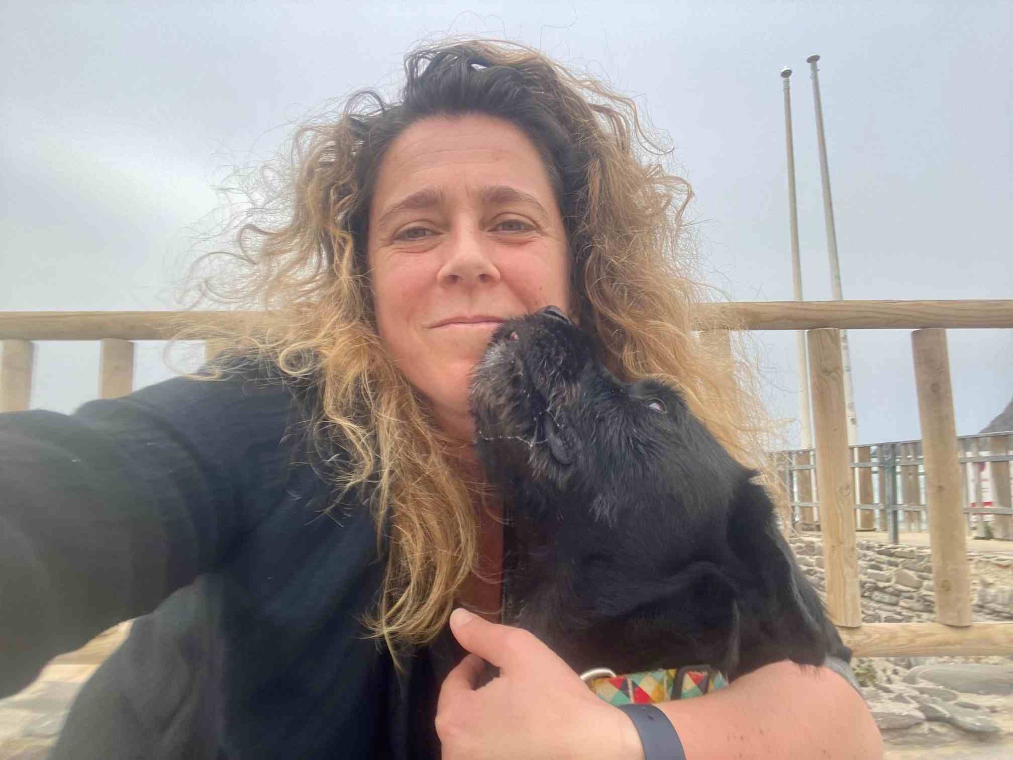 Graça, a Breast Cancer Survivor with her beloved dog